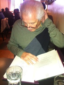 A candid shot of Sal Liggieri, as he ponders the extensive and exceptionally healthy menu at the Candle Cafe